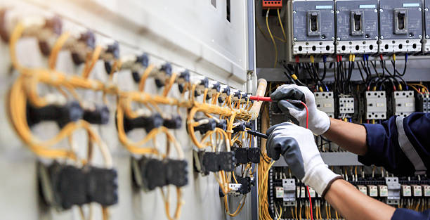Professional Electrician technician working in Wilderness Rim, WA